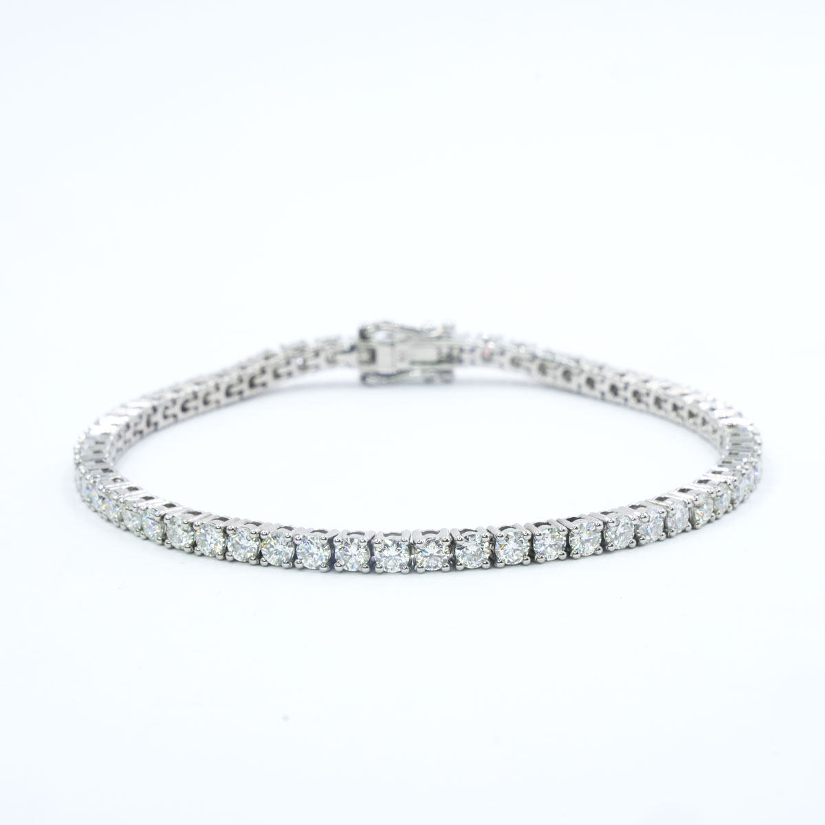 illusion setting diamond tennis bracelet | Diamond bracelet design, Diamond  pendants designs, Diamond jewelry designs